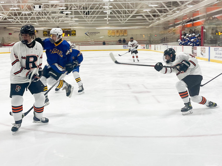 Rome Free Academy junior John Sharrino takes a shot on goal during the team&rsquo;s scrimmage against Cazenovia at Kennedy Arena. Sharrino is back as one of the Black Knights&rsquo; top scorers from last season.