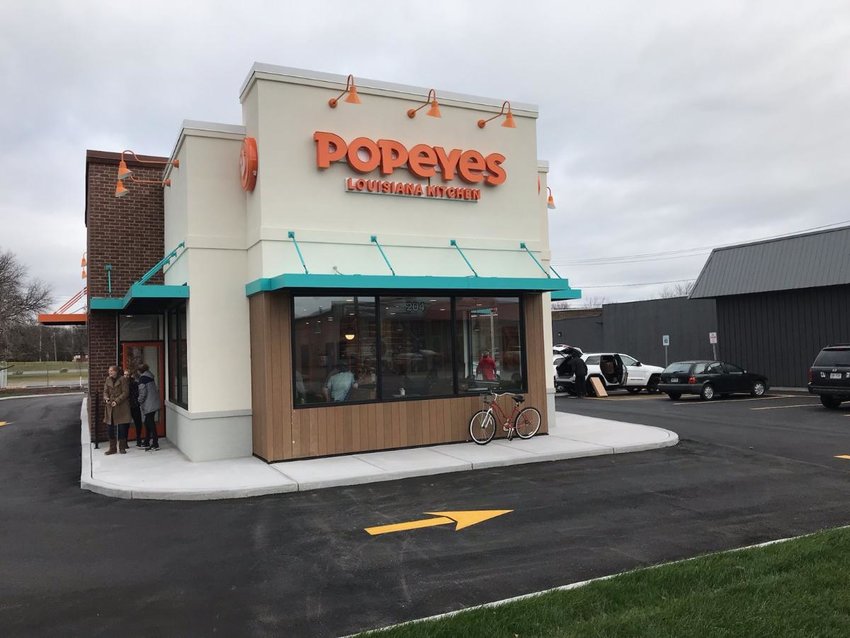 Workers were putting the finishing touches on the new Popeyes Louisiana Kitchen restaurant at 204 Genesee St. in Oneida on Thursday, Dec. 1. The doors of the eatery will open Monday, Dec. 5, at 10 a.m.