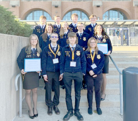 VVS FFA members Molly, second row far right, and Gabrielle Adams, front row far left, hold their American Degree Awards during the FFA National Convention in October in Indianapolis. They are joined by Devon Conley, Mason Ziemba, Jarrod Scroggs, Colin Wood, Gianna White, Sarah Moyer, Brenden Geni, Logan Sherwood, Mark Hoffman and Ella Lenhart.
