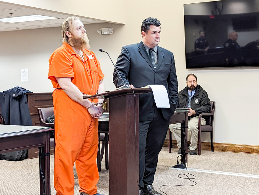 Matthew Westcott appears in court with his lawyer in this file photo from Oneida County Court. Matthew Westcott is accused in the shooting death of his brother James Westcott in their Taberg family home.