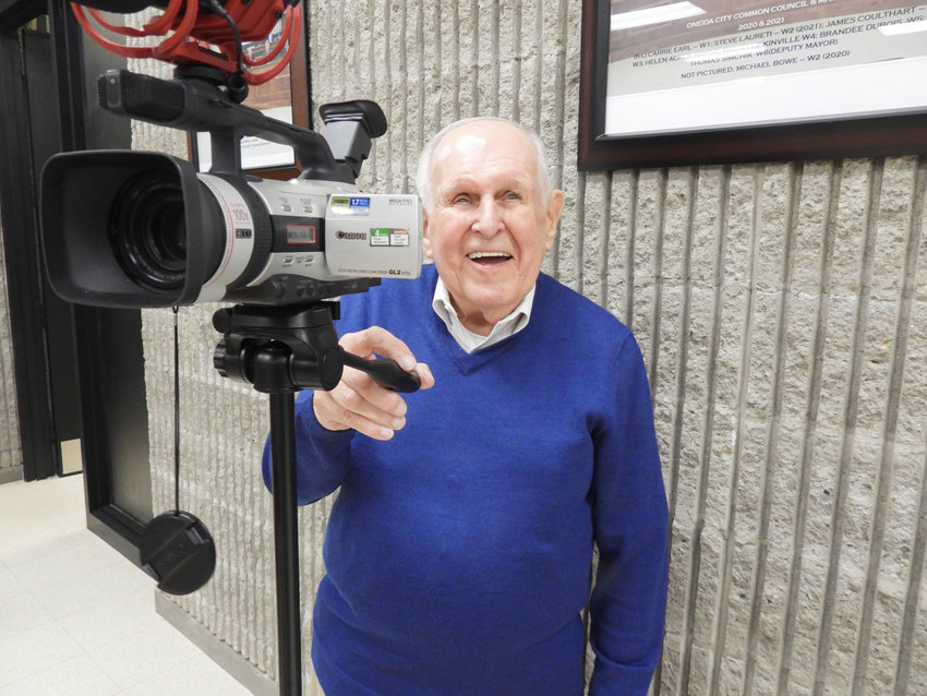 Bruce Burke caught smiling behind the camera while recording an event in the Oneida City Council Chambers in November.