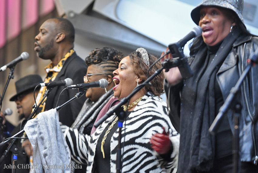 The Bank of Utica New Year's Eve celebration with the Ladies of Soul and Their Gentlemen performing for rain soaked revelers Saturday, December 31, 2022.