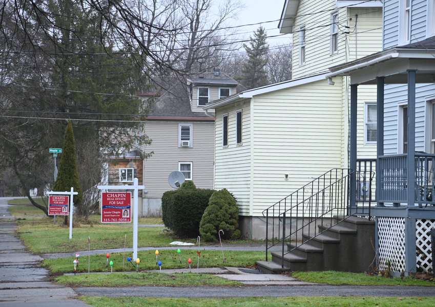 Pictured are houses for sale on Lexington Ave in Oneida Wednesday, December 4, 2023.