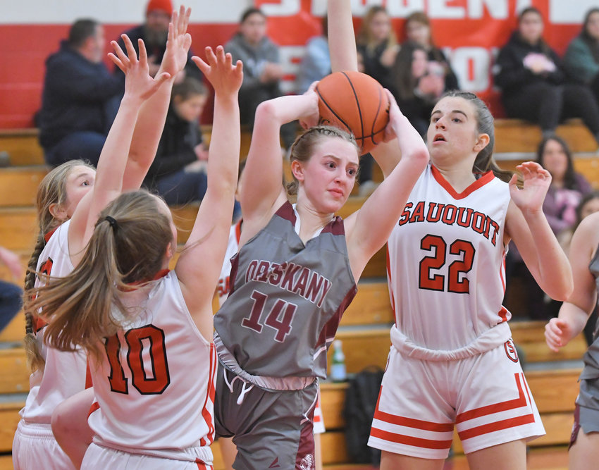 Oriskany&rsquo;s Megan Wright looks to pass while surrounded by Sauquoit Valley players Jadyn Land (42), Allison Crandall (10) and Makayla Land (22) in the first quarter Wednesday night at Sauquoit. Wright scored 12 points and Oriskany won 44-30.