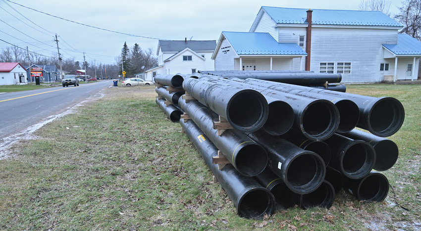 Sewer pipes to be installed along opposite the New London Fire Hall Monday, January 9, 2023.