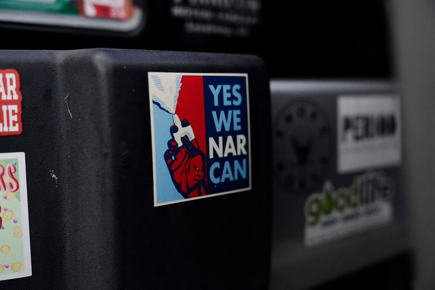 Jessie Blanchard's jeep bumper holds a sticker with the slogan &quot;Yes We Narcan&quot; on Monday, Jan. 23, 2023, in Albany, Ga. Naloxone, available as a nasal spray and in an injectable form, is a key tool in the battle against a nationwide overdose crisis linked to the deaths of more than 100,000 people annually in the U.S.