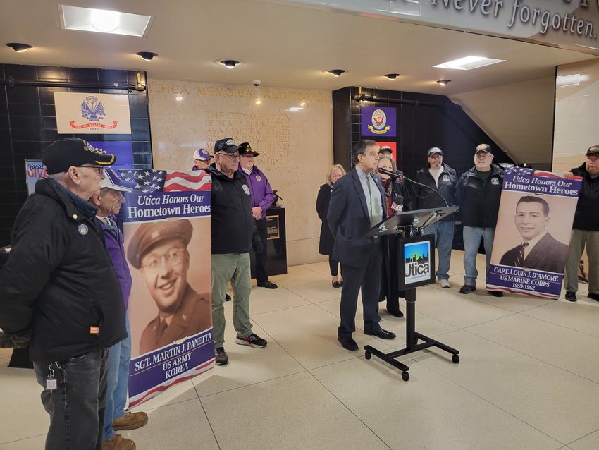 Utica Mayor Robert Palmieri, assisted by local veterans and volunteers, unveils the expansion of the city&rsquo;s Hometown Heroes Banner Program, which will now include the newly-renovated Oriskany Boulevard corridor.