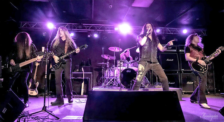 Beyond the Wrath, featuring frontman Ronny Munroe, center, and Oneida&rsquo;s own guitarist Roy Coston, second from left, bring their hard rocking metal to the stage at 8 p.m. Feb. 18 at the Kallet Civic Center in Oneida.
