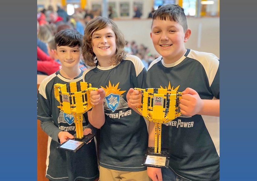 Clinton Central School seventh graders, from left, Ben Wileczka, Jack Wilson and Nicholas  Venero, recently won the Champion&rsquo;s Award at the FIRST LEGO League Regional Championship at Clarkson University.