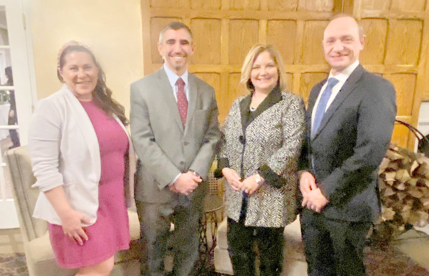 Nearly 70 employees and volunteers from various credit unions in the Utica-Rome area joined together for a 2023 economic outlook as the AmeriCU Credit Union hosted the New York Credit Union (NYCUA) Utica-Rome Chapter Dinner earlier this month at the Yahnundasis Golf Club. Among those in attendance, from left, included: Kari Puleo, executive director of the Greater Utica Chamber; Greg Mattacola, first vice chairman of the Rome Area Chamber of Commerce; Michele Hummel, executive director of the Herkimer County Chamber of Commerce; and Ron Belle, AmeriCU president and CEO.