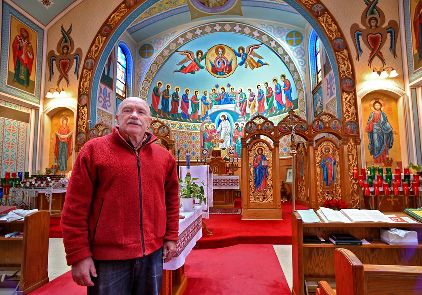 ALTAR &mdash; Zyn Jackiw, a trustee in the St. Volodymyr the Great Ukrainian Catholic Church, at 4 Cottage Place in Utica, shows a visitor the chancel and altar on Tuesday, Feb. 21. A church altar is often referred to as the &ldquo;sanctuary,&rdquo; meaning &ldquo;sacred place.&rdquo; Today at 5 p.m., St. Volodymyr will participate in a worldwide prayer and remembrance event to observe those who have died and the damage caused during Russia&rsquo;s invasion of Ukraine which started one year ago.
