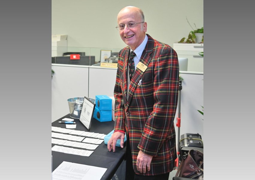 Bill Guglielmo is shown greeting participants at a Rome Area Chamber of Commerce Chamber Business After Hours event at the Daily Sentinel&rsquo;s Rome offices in late November 2022. The event was one of Guglielmo&rsquo;s last official appearances on behalf of the organization he served for 50 years.