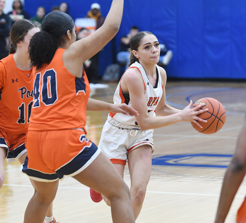 Rome Free Academy senior guard Alysa Jackson navigates traffic with Liverpool's Kaylyn Sweemey and Angeliena Kohler (40) defending Saturday afternoon at Onondaga Community College in the semifinals of the Section III Class AA tournament. Jackson scored nine points but RFA fell 69-52.