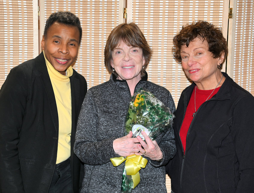 Rome Free Academy Guidance Counselor Maureen Nash receives the Zonta Club Rose Award during a brief ceremony at RFA on Wednesday morning.  From left: Dr. Camille Dillard, president of the Rome Zonta Club; Nash; and Dr. Patricia DeMatteo, Rome Zonta vice president.