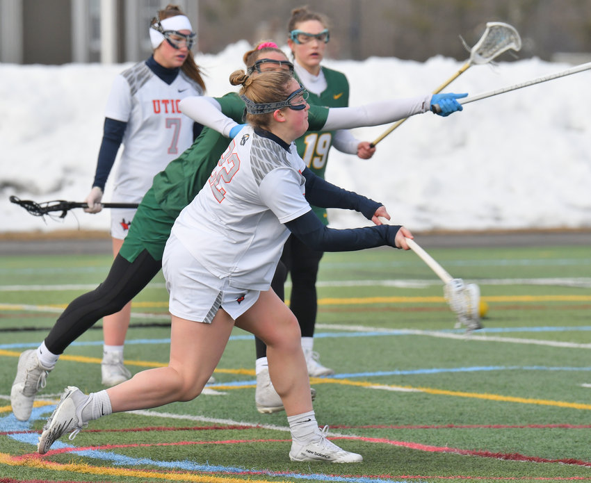 SHOOTS AND SCORES &mdash; Utica University&rsquo;s Samantha DeCondo, of Whitesboro, shoots and scores against SUNY Oswego during the first quarter of non-league women&rsquo;s lacrosse action on Wednesday at Gaetano Stadium in Utica. DeCondo scored a pair of goals, but the Pioneers were edged 6-5.