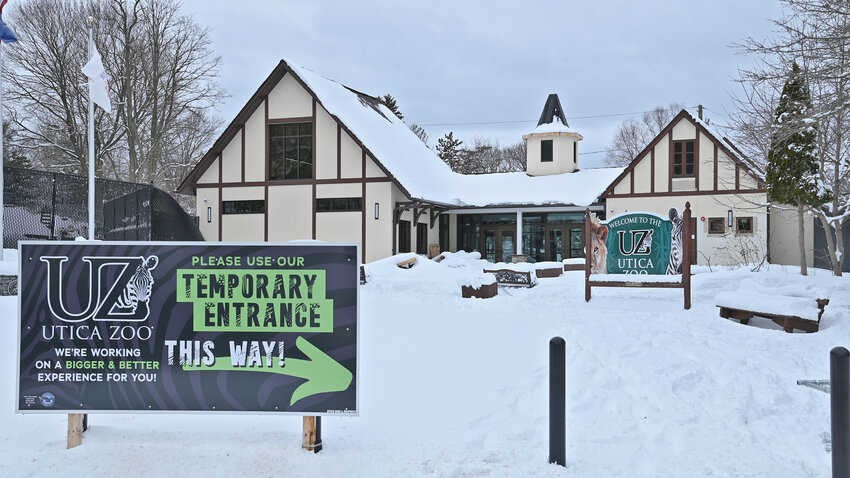 Signage directs visitors to a new, temporary entrance as work progresses on the new Welcome Center at the Utica Zoo on Wednesday, March 15. The project includes $2 million in American Rescue Plan Act funding, one of dozens of projects set to help reinvigorate the community, according to city officials.