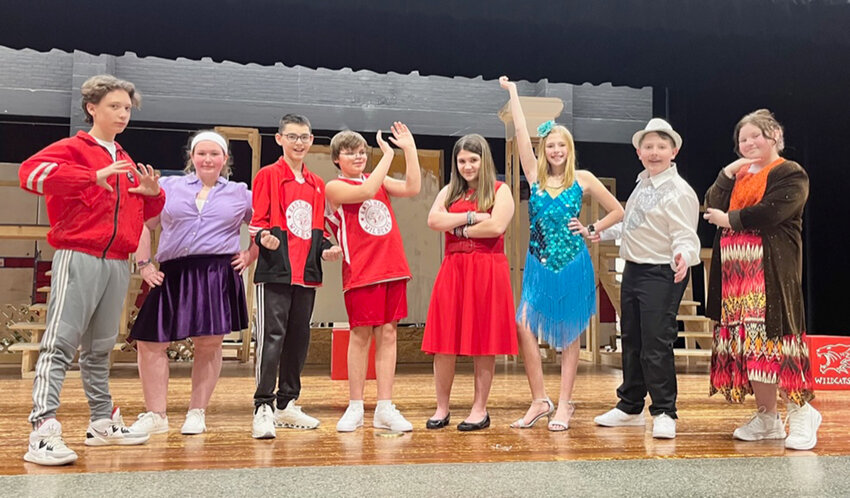 Denti Elementary School students, including, from left, Emmett Newton as Coach Bolton, Lily Riolo as Taylor, Jacob Vanderhoof as Chad, Ryan Bush as Troy, Elayna Koor as Gabriella, Alexis Pape as Sharpay, Logan Edick as Ryan and Alora Woodlan as Ms. Darbus present Disney&rsquo;s &ldquo;High School Musical&rdquo; at 6:30 p.m. March 23 and 24 in the Strough Junior High School auditorium in Rome.