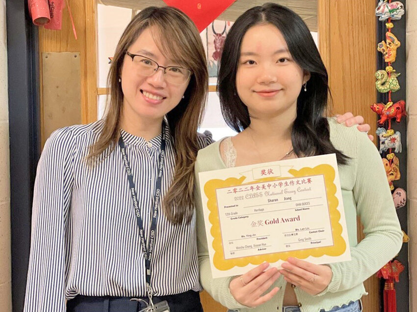 OHM BOCES Mandarin Chinese teacher WeiShu Chang, left, poses with New Hartford Central School senior Sharon Jiang.