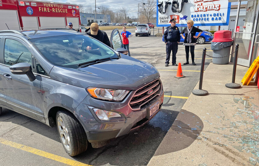 Yorkville Police investigate after the driver of this SUV crashed into the front of Holland Farms Bakery &amp;amp; Deli on Oriskany Boulevard in Yorkville Friday afternoon.