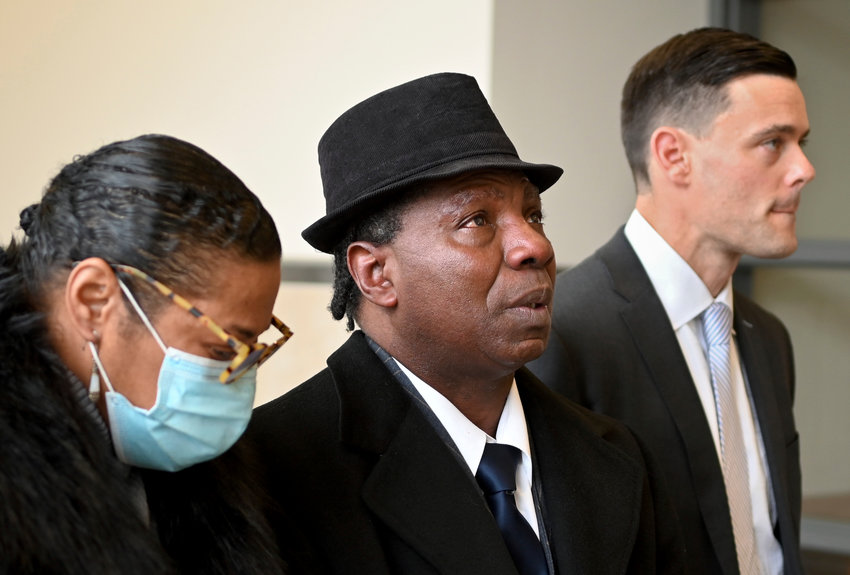 Anthony Broadwater, center, gazes upward, Nov. 22, 2021, in Syracuse, N.Y., after Judge Gordon Cuffy overturned the 40-year-old rape conviction that wrongfully put him in state prison for Alice Sebold's rape. Broadwater, who spent 16 years in prison, has settled a lawsuit against New York state for $5.5 million, his lawyers said Monday, March 27, 2023.