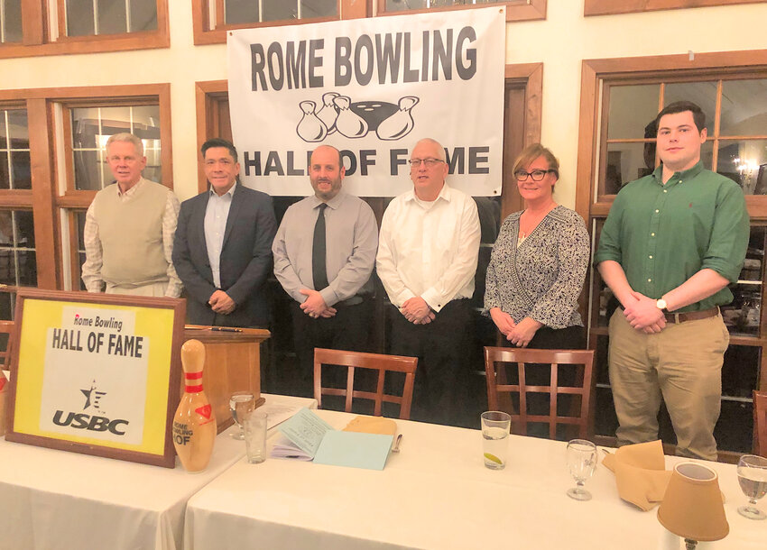 2023 ROME BOWLING HOF INDUCTEES &mdash; The Rome Bowling Hall of Fame held its annual induction ceremony on Saturday night at Teugega Country Club. This year&rsquo;s inductees were Vie Evans, the late Julie Hooks, Michael Ferlo Jr. and the late Bradley Ruble. Pictured from left are Crispin Hooks, husband of Julie Hooks; Dennis Hooks, son of Julie Hooks; Mike Ferlo Jr.; Mark Rundle, brother of Brad Ruble; Christie Evans, daughter-in-law of Vie Evans and Conrad Evans, grandson of Vie Evans.