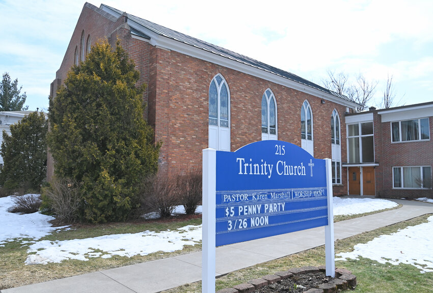 The sign at Trinity Church, 215 W. Court St., Rome, displays a schedule of events and activities hosted by the church.