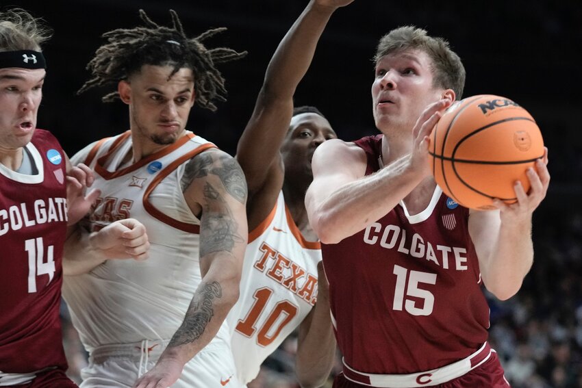 Colgate senior Tucker Richardson drives to the hoop during an NCAA tournament first-round game on March 16 against Texas.