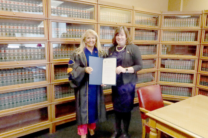 The Hon. Bernadette Clark, left, a justice on the Oneida County Supreme Court in the state&rsquo;s Fifth Judicial District, receives a New York State Assembly Citation from Assemblywoman Marianne Buttenschon, D-119, Marcy at a recent ceremony.