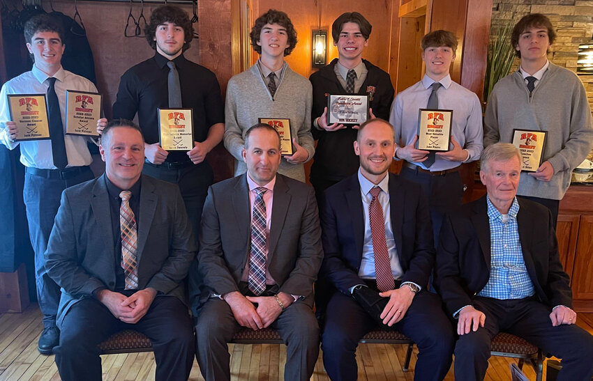 RFA HOCKEY AWARDS &mdash; The following players were recognized recently at the Rome Free Academy boys hockey banquet at the Delta Lake Inn. Front row, from left, assistant Mark Gualtieri, assistant Dave Petrelli, head coach Jason Nowicki and assistant Bill Fleet. Back row from left: Jack Pylman (Vacuum Award and Scholar Athlete), Jacob Swavely (Rick Lefevre Memorial Award), Logan Waterman (Most Improved Player), Tyler Wilson (Bobby T. Ciccotti Award), Jacob Premo (Most Valuable Player) and Carmen Orton (Coaches&rsquo; Award).