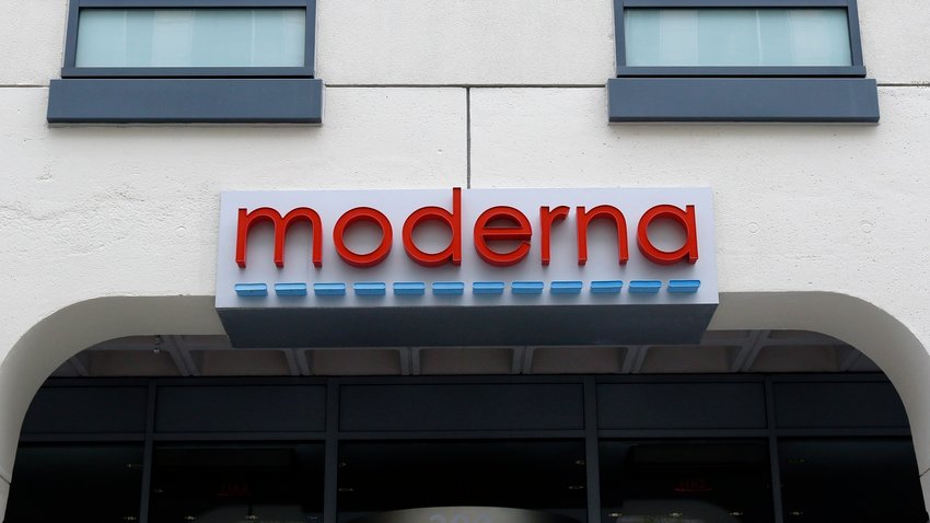 A sign marks an entrance to a Moderna building in Cambridge, Mass., on Monday, May 18, 2020.   Moderna shares slipped Tuesday, April 11, 2023, after the COVID-19 vaccine developer said its potential flu vaccine needs more study in a late-stage clinical trial.