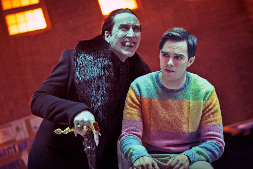 Nicholas Hoult, right, and Nicolas Cage in a scene from &ldquo;Renfield.&rdquo;