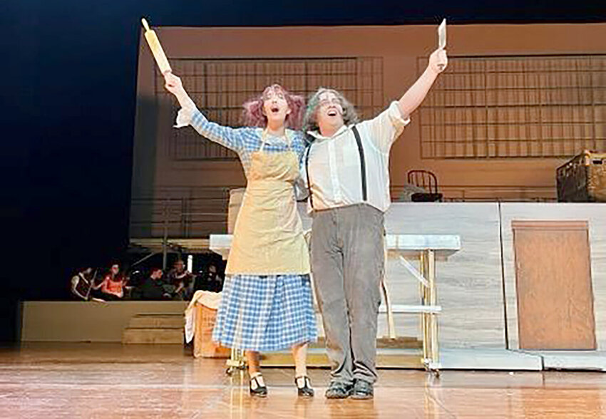 Caitlyn Hampe, left, and Jake Cosentino rehearse a scene from the Rome Free Academy musical &ldquo;Sweeney Todd: School Edition,&rdquo; coming to their auditorium stage at 7:30 p.m. April 27- 29 in Rome.