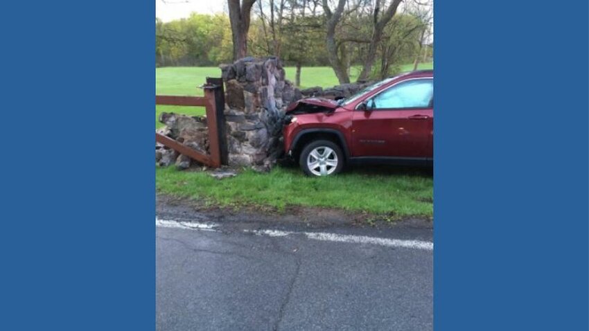 Both the SUV and the stone wall were heavily damaged at Sherrillbrook Park in New Hartford Monday evening, according to the New Hartford Police Department.