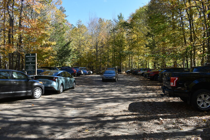 An Adirondack Mountain Reserve parking lot in St. Huberts is seen here full of cars in this October 2019 file photo.