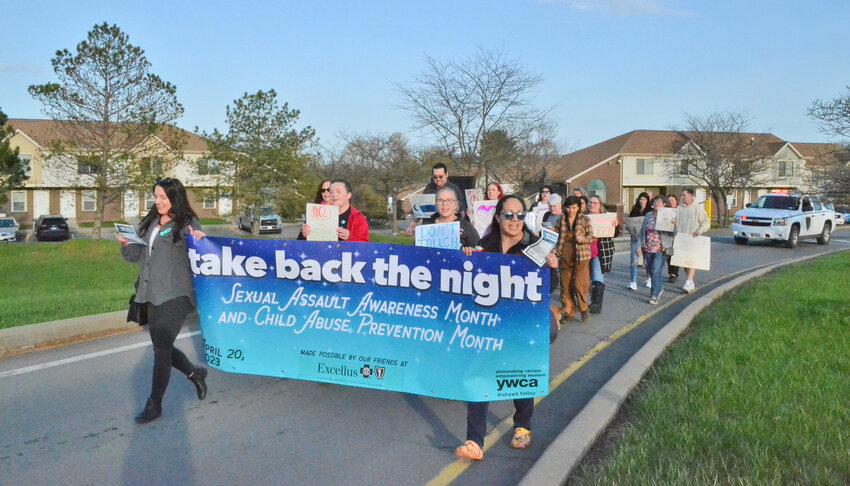 Supporters and survivors march in Herkimer to Take Back the Night in Herkimer on April 20.