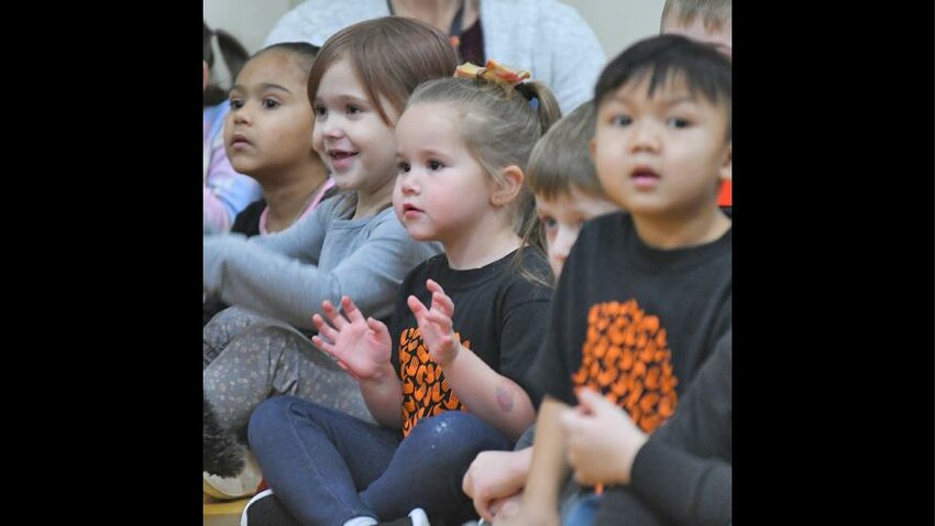 Happy Pre-K students react to the Rome Free Academy Rhapsody show choir's performance Jan. 13 at Clough School in Rome. Area residents will go to the polls May 16 to vote on their school districts' budgets and school board candidates.