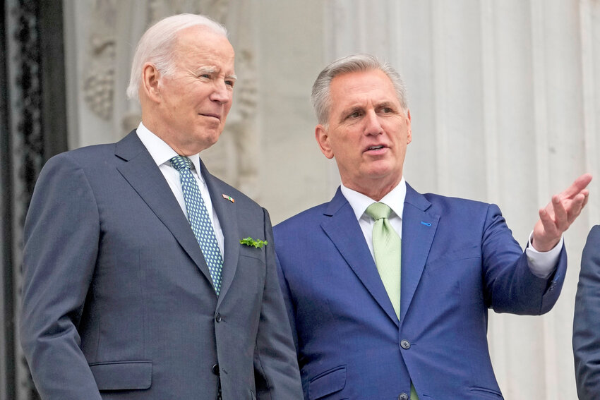 President Joe Biden talks with House Speaker Kevin McCarthy of Calif., on the House steps as they leave after attending an annual St. Patrick&rsquo;s Day luncheon gathering at the Capitol in Washington. Facing the risk of a government default as soon as June 1, President Joe Biden has invited the top four congressional leaders to a White House meeting for talks on Tuesday, May 9.