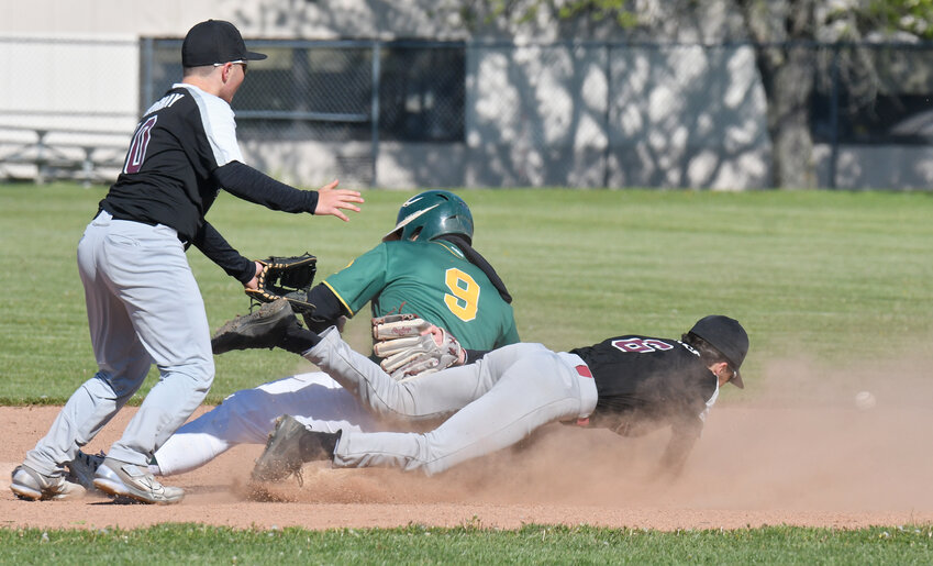 Adirondack&rsquo;s Colin White slides safely into second base as Frankfort-Schuyler&rsquo;s Conner Grates hits the deck and Jack McMurray arrives at left. Adirondack won 18-4 on the road Wednesday and White had two hits, three runs and an RBI.