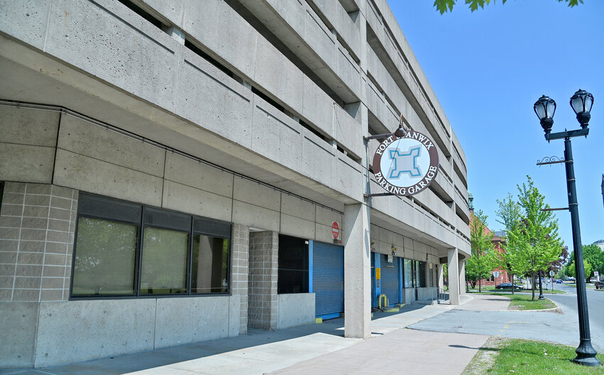 The exterior of Fort Stanwix Parking Garage is shown on Thursday, May 18. The garage and its former office space are shuttered and awaiting demolition. The city is seeking public input on plans for that project as well as a pair of other ongoing projects and has scheduled times next week for public comment.