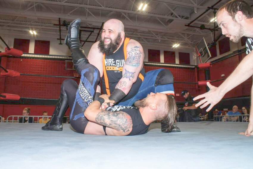 Oneida&rsquo;s own Brute VanSlyke smiles as he applies a submission hold called &ldquo;The Claw&rdquo; to Ceran Rahne. VanSlyke will return home for the Clash at the Kallet event at 6 p.m. May 27 at the Kallet Civic Center.