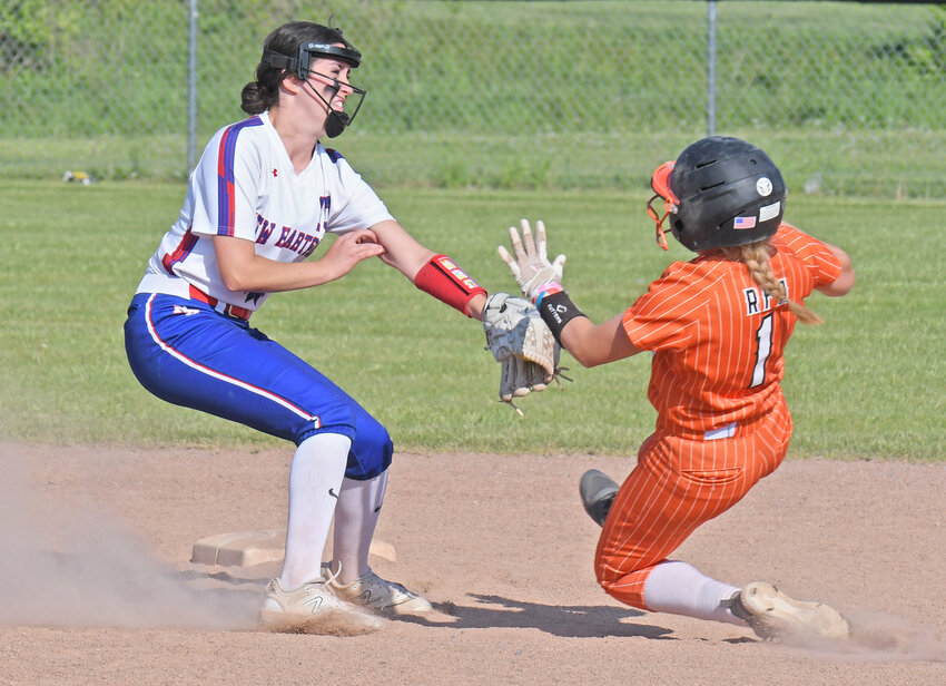 New Hartford shortstop Danielle Lucas puts the tag on Rome Free Academy baserunner Madison Safin Thursday at Kost Field in Rome. Safin was out on the play and New Hartford went on to an 11-0 win.