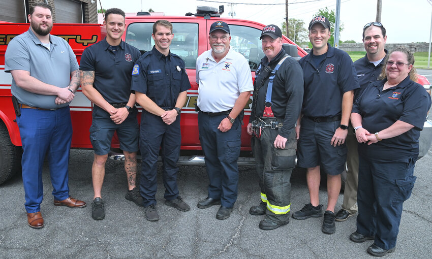 Four members of the Rome Fire Department and three EMTs from AmCare Ambulance were recognized Wednesday morning for successfully reviving an ailing Rome resident last week. Mid-State EMS presented all seven with a Certificate of Recognition at Central Fire Station on Black River Boulevard. From left: Jarrod Waufle, Midstate EMS; Rome Firefighter Kyle Liddy; Firefighter Todd Stevens; AmCare President Paul Taylor; Rome Fire Lt. Dean Lenhart; Firefighter Philip Urtz; Vincent Ouimette, program agency director for Midstate EMS; and Melissa Norrs, a critical care technician with AmCare.