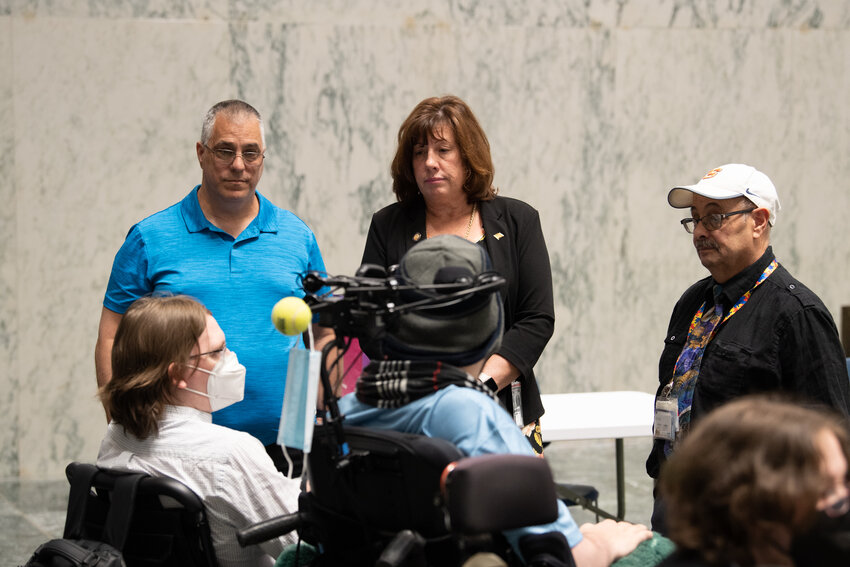 Assemblywoman Marianne Buttenschon meets with constituents recently in Albany regarding legislation that would address some of the challenges faced by state and local residents with disabilities.