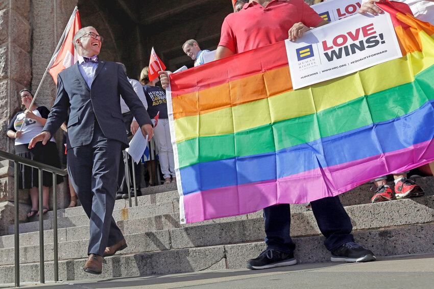 Jim Obergefell, the named plaintiff in the Obergefell v. Hodges Supreme Court case that legalized same sex marriage nationwide, arrives for a news conference on the steps of the Texas Capitol, June 29, 2015, in Austin, Texas. The start of June marks the beginning of Pride month around the U.S. and some parts of the world, celebrating the lives and experiences of LGBTQ+ communities as well as raising awareness about ongoing struggles and pushing back against efforts to roll back civil rights gains that have been made.