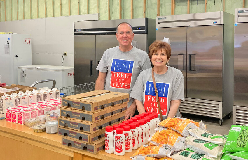 Andy Kistowski and Cheryl Salvo are volunteers at Feed Our Vets on Broad Street in Utica.