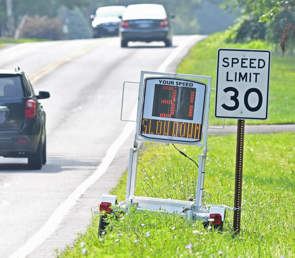 DETERRING SPEEDERS — The Town of Lee is buying a portable radar-speed sign, similar to this device as seen on Jervis Avenue in Rome, in an effort to slow down speeding drivers after getting complaints from residents.
 (Sentinel photo by John Clifford)