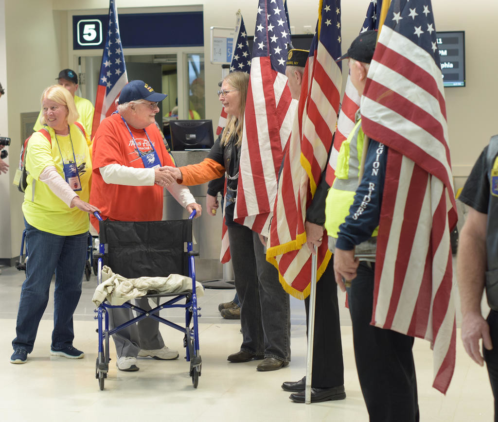 A HERO’S WELCOME — Korean War Army vet Richard H. “Jake” Jacobs, of Cortland, is welcomed back from a long day at Hancock International Airport in Syracuse.
 (Sentinel photo by Frank Page)