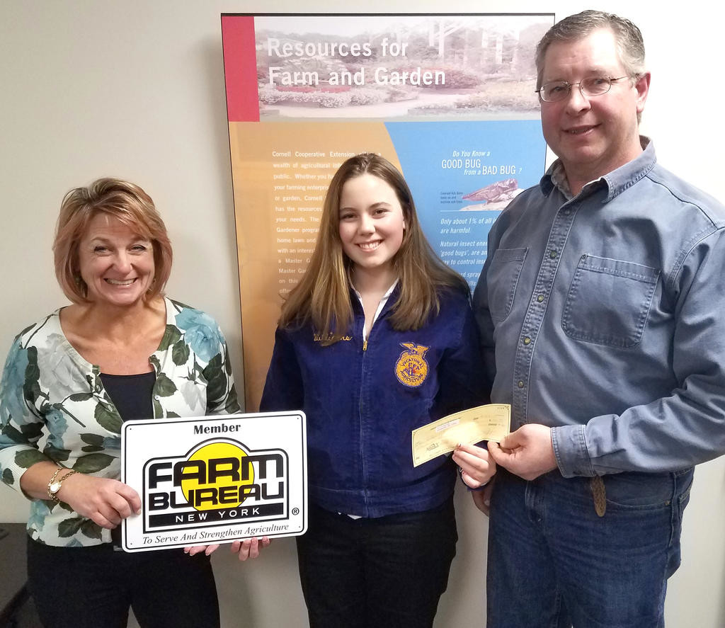 Remsen FFA Donation — Oneida County Farm Bureau President Kevin Angell, right and Promotion and Education Chair Karen Lohr present a $500 check to the Remsen FFA.
 (Photo submitted)