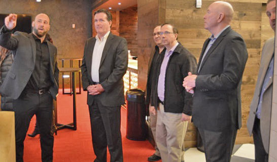 AUDITORIUM UPGRADES REVIEWED — Mohawk Valley Garden President Robert Esche, at left, discusses upgrades to the Utica Memorial Auditorium during a visit by state Senate Majority Leader John Flanagan, second from left, and state Sen. Joseph A. Griffo, third from right.
 (Photo submitted)