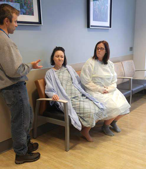 THE FINAL LAP — Tara Salerno, left, and her sister Tiffany Seoane, of Rome, make faces as their post-operation recovery process is explained to them by a surgeon at New York Presbyterian Hospital. The sisters are preparing to come home and renew their lives after Salerno donated the right lobe of her liver to combat the auto-immune disorder that was threatening Seoane’s life.
 (Photo submitted)